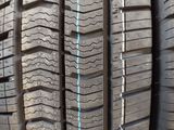 a close up of a tire with a blue line on the side of it