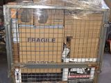 a cart that has a bunch of boxes in it