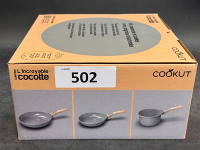 a box that has some cooking utensils inside of it