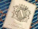 a book with a picture of a coat of arms on it