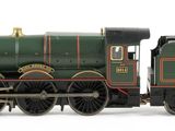 a toy train that is sitting on a white surface