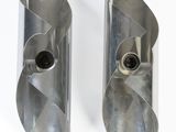 two pieces of metal that are sitting on top of each other
