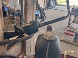 an image of a machine that is in a garage