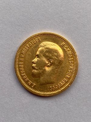 l'image d'une pièce d'or sur laquelle figure le visage d'un homme