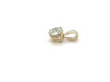a close up of a single diamond pendant on a white background