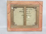 an old picture frame with writing on the inside of it