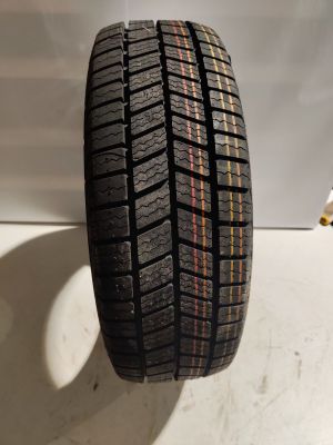 a close up of a tire on a white surface