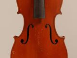 a close up of a violin with a bow on a white background