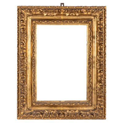 un cadre en vieil or orné d'un motif décoratif sur fond blanc
