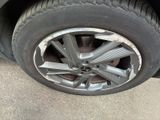 a close up of a tire on a car ' s rim