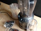 a blender that is sitting on a wooden table