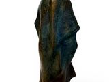 statue of a man with a hat on his head on a white background