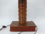 a lamp that is sitting on top of a book
