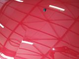 a large red object in the middle of a room