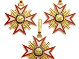 trois médailles d'or ornées d'étoiles rouges et bleues