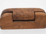 an old wooden box with a wooden handle on a white background