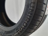 a close up of a tire on a white surface