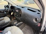 a picture of a small car with a steering wheel