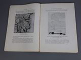 an open book with a picture of a map on it