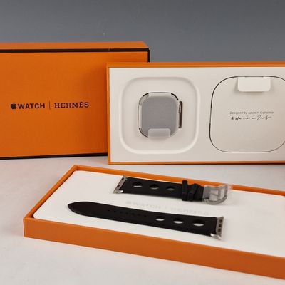 a watch in a box with a watch inside of it