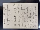 a close up of a handwritten letter on a piece of paper
