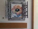 a picture of a picture of a flower on the wall