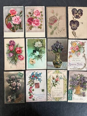 a lot of cards with flowers on them on a table