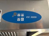 a close up of a blue sign on a metal surface