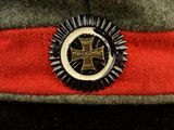 an image of a hat with a badge on it