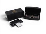 the glasses are in a black box and are next to a pair of glasses