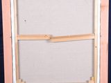 an easel with a painting on it sitting on a blue background