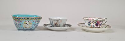 three cups and saucers are lined up on a white surface