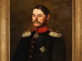 portrait d'un homme en uniforme militaire dans un cadre doré