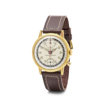 gros plan d'une montre sur fond blanc avec un bracelet marron