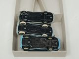 a box with three pieces of electrical equipment inside of it