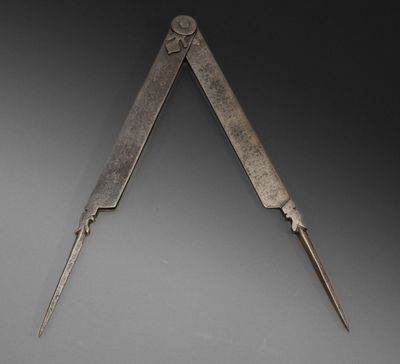 a close up of a pair of scissors on a table