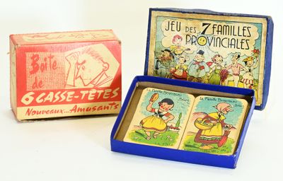 two boxes of cigarettes and a box of matches on a white surface
