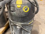 an image of a vacuum cleaner in a garage