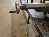 a machine that is working on a piece of metal