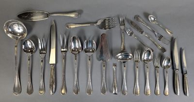 a lot of silverware on the table with spoons and spoons