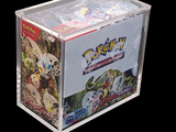 a clear box with a picture of a pokemon figure inside of it