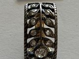 an image of a silver ring with diamonds on it