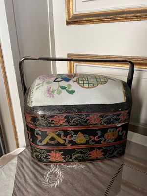 a black and white box sitting on top of a table