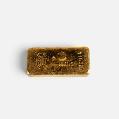 a gold bar on a white background