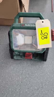 a light that is sitting on the ground in a store