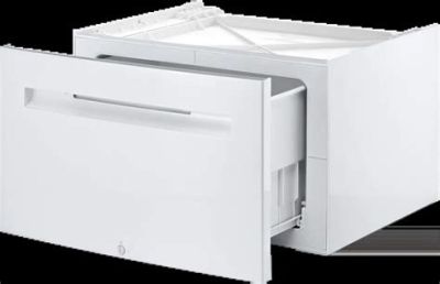une photo d'un lave-vaisselle blanc dont la porte est ouverte