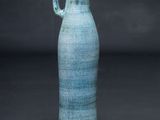 an image of a blue vase on a black background