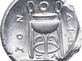 an image of a silver coin with an image of a pot on it