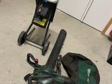 a bag and a vacuum on the floor in a room