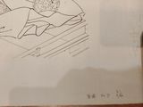 a drawing of a woman laying on a bed